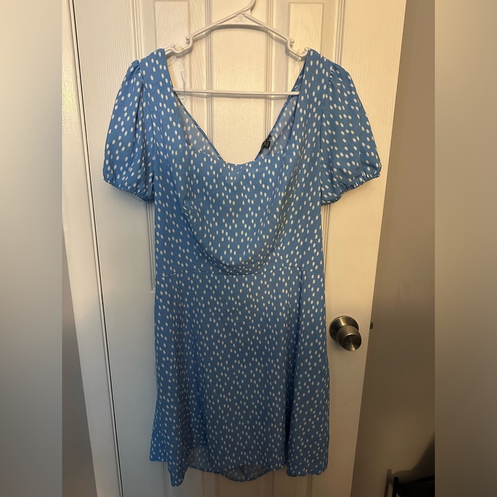 Lily Rose blue dress with white pokodots and open back